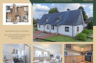 Mehrfamilienhaus kaufen in 24790 Schacht-Audorf, Mehrfamilienhaus mit 3 Einheiten, großem Grundstück und Erweiterungspotenzial in Schacht-Audorf
