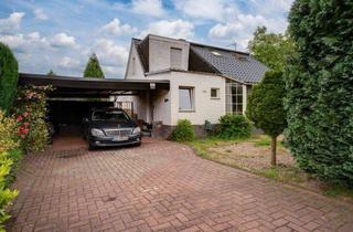 Einfamilienhaus kaufen in 46446 Emmerich, Emmerich: Einfamilienhaus mit Wintergarten, Carport und liebevoll angelegtem Garten