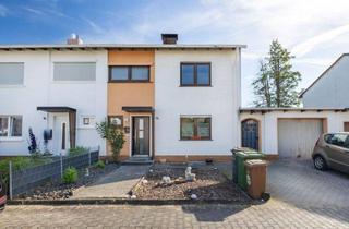 Doppelhaushälfte kaufen in 56203 Höhr-Grenzhausen, Doppelhaushälfte in Höhr-Grenzhausen - mit großer überdachter Terrasse, Garten und Garage