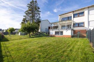 Doppelhaushälfte kaufen in 56203 Höhr-Grenzhausen, Doppelhaushälfte in Höhr-Grenzhausen - mit großer überdachter Terrasse, Garten und Garage
