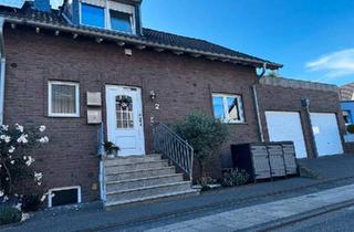 Reihenhaus kaufen in 50127 Bergheim, Bergheim - Einfamilienhaus mit Garage und Einliegerwohnung Haus Reihenhaus