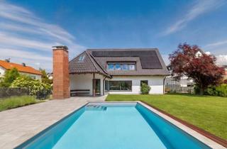 Einfamilienhaus kaufen in 89269 Vöhringen, Stil, Design und Eleganz: Exklusives Einfamilienhaus mit Gartenoase und Pool