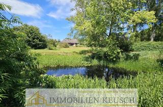 Haus kaufen in 27367 Hassendorf, Traumgarten mit Teich, Bungalow mit Ausbaupotenzial & Sonnenterrasse in ruhiger Lage, Doppelgarage