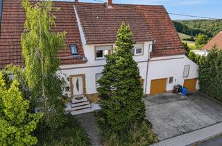 Haus kaufen in 66879 Reichenbach-Steegen, 7,7 % Rendite: vermietetes Haus mit 3 Garagen und 3 Stellplätzen