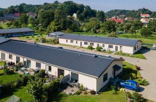 Haus kaufen in 16259 Falkenberg, Acht Wohneinheiten, Garagen, Garten u.v.m. in Falkenberg: Moderne und werthaltige Kapitalanlage!