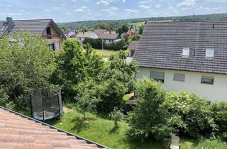 Doppelhaushälfte kaufen in 96154 Burgwindheim, Großzügige versetzte Doppelhaushälfte mit Einliegerwohnung, Garten und Garage - in ruhiger Lage