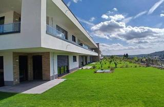 Wohnung kaufen in 65527 Niedernhausen, NEUBAU-ERDGESCHOSSWOHNUNG MIT SÜDTERASSE & EIGENEM GARTEN