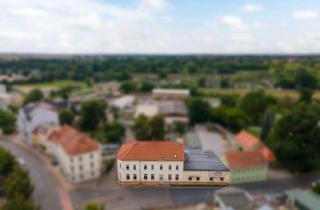 Anlageobjekt in 01558 Großenhain, Investment mit Cashflow und Entwicklungsreserve - saniertes Wohn- und Geschäftshaus in Großenhain.