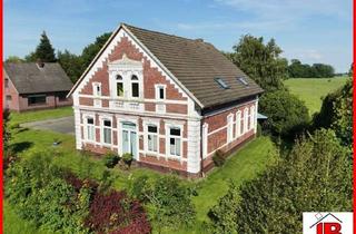 Haus kaufen in 26936 Stadland, Historisches Anwesen mit Nebengebäuden und besonderer Fassade