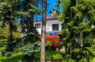 Einfamilienhaus kaufen in 61250 Usingen, Großes Einfamilienhaus, ideal für Familie, Beruf und Hobby, Grundstück mit einzigartigem Baumbestand