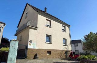 Einfamilienhaus kaufen in 65558 Burgschwalbach, Charmantes Einfamilienhaus mit viel Platz, Garage, Garten in Burgschwalbach