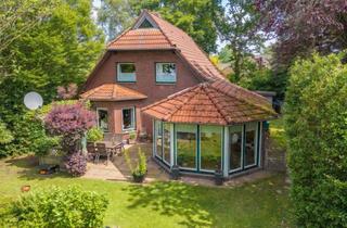 Haus kaufen in 26446 Friedeburg, Charmantes Wohnen mit Wintergarten, Erker und besonderem Gartenambiente