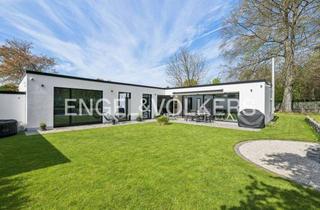 Haus kaufen in 64546 Mörfelden-Walldorf, Design trifft Zukunft: Kernsanierter Architekten Bungalow mit A+ Energieeffizienz und Traumgarten...