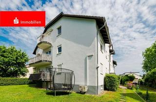 Wohnung kaufen in 61381 Friedrichsdorf, Burgholzhausen: Gemütliche Dachgeschosswohnung mit Blick auf die Frankfurter Skyline