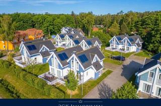 Haus kaufen in Bernsteinpark, 18556 Breege, Ferienhaus an der Ostsee (78 m²): Kurzer Weg zum Strand, Boddenblick, Sauna, Whirlpool & Kamin!