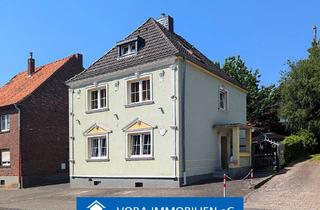 Einfamilienhaus kaufen in 52531 Übach-Palenberg, Wohnen mit Charakter!