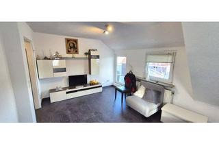 Wohnung kaufen in 73061 Ebersbach, Modernisierte 2,5-Zimmer-Wohnung mit überdachten Terrasse und neuer Einbauküche