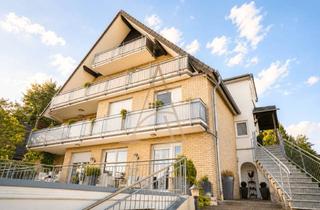 Wohnung kaufen in 53773 Hennef, 174 m² Wohnkomfort | Modernisierte 5-Zimmer-Wohnung mit Garten & 2 Carports in Hennef-Oberauel