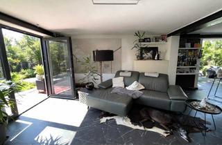 Wohnung kaufen in 96135 Stegaurach, Sanierte, moderne 2,5-Zimmer-Erdgeschosswohnung mit stilvollem Wintergarten und einladender Terrasse