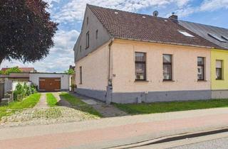 Doppelhaushälfte kaufen in 39539 Havelberg, Viel Platz für Ihre Zukunft – Doppelhaushälfte mit Potenzial für zwei Wohneinheiten