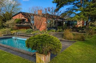 Haus kaufen in 90587 Obermichelbach, Wohnen wie im eigenen Resort - exklusiver Bungalow mit parkartigem Grundstück