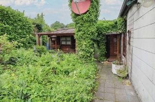 Einfamilienhaus kaufen in 52134 Herzogenrath, Sanierungsbedürftiges Einfamilienhaus mit Potenzial auf 310 m² Grundstück in Herzogenrath-Kohlscheid