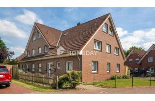 Mehrfamilienhaus kaufen in 49637 Menslage, Mehrfamilienhaus mit 4 Wohneinheiten, Garten, Dachboden, Carports und ca. 360 m² Wohnfläche
