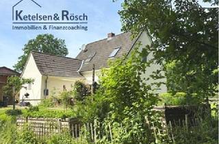 Einfamilienhaus kaufen in 24392 Süderbrarup, Privilegiertes Wohnen - Saniertes Einfamilienhaus in erster Reihe am See