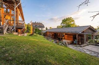 Haus kaufen in 82340 Feldafing, Architektur-Bungalow in Hanglage am Starnberger See