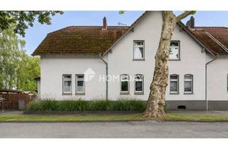Reihenhaus kaufen in 46240 Eigen, Charmantes Reihenhaus mit großem Grundstück und viel Potenzial