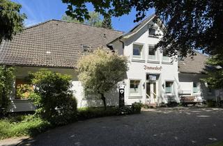Mehrfamilienhaus kaufen in 25712 Burg, Kapitalanlage im Grünen – Flexibles Wohnensemble!
