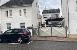 Haus kaufen in 56220 Urmitz, Urmitz - 2 Einfamilienhäuser auf einem Grundstück zu verkaufen