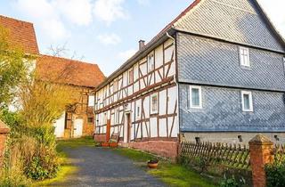 Haus kaufen in 34225 Baunatal, Baunatal - Fachwerkhaus mit Ausbaureserve, Scheune und Baugrundstück
