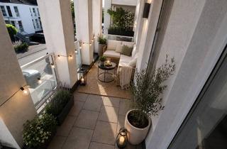 Wohnung kaufen in 53773 Hennef, Lichtdurchflutete 4-Zimmer-Eigentumswohnung mit Balkon & TG-Stellplätzen in zentraler Lage