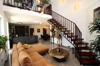 Wohnung kaufen in 91522 Ansbach, Stilvoll wohnen über den Dächern – Maisonette mit Balkon