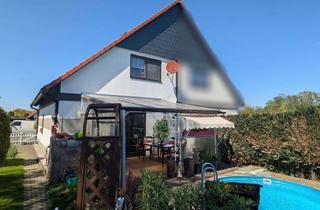 Doppelhaushälfte kaufen in 04651 Bad Lausick, Charmante Doppelhaushälfte mit überdachter Terrasse und Pool