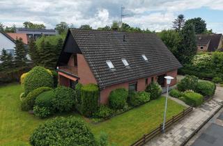 Haus kaufen in 26197 Großenkneten, Großzügiges Ein-/Zweifamilienhaus mit Einliegerwohnung, Kamin & Dachterrasse in Huntlosen
