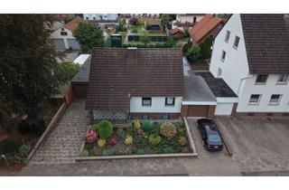 Einfamilienhaus kaufen in Breslauer Str. 33, 31157 Sarstedt, Wohnen mit viel Platz – Großzügiges Einfamilienhaus mit Wintergarten, Sauna und zwei Garagen