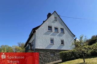 Haus kaufen in 57080 Siegen, Charmantes Zweifamilienhaus – freistehend in guter Wohnlage von Siegener‑Ortsteil