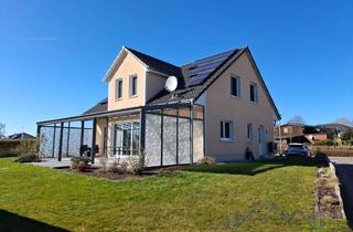 Einfamilienhaus kaufen in 24392 Süderbrarup, Familienfreundliches Einfamilienhaus mit großer Glas-Terrasse & moderner Energietechnik