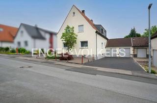 Haus kaufen in 58239 Schwerte, Großzügiges Zweifamilienhaus mit idyllischem Garten, zwei Garagen und viel Potenzial in Holzen