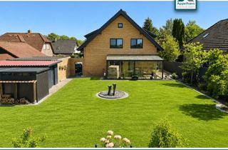 Haus kaufen in 49626 Bippen, Modernisiertes Zweifamilienhaus mit zwei Wohneinheiten, Wintergarten, Kamin und großzügigem Garten