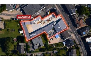 Grundstück zu kaufen in 52355 Düren, Bau-/Gewerbegrundstück in zentraler Lage von Niederau • Vermietete Lagerhalle und -flächen