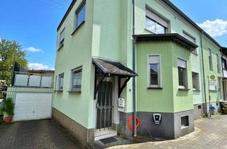 Haus kaufen in Kirchenstraße 9-11, 66793 Saarwellingen, Gepflegtes 2-Familienhaus mit Garten + Garage, teilsaniert