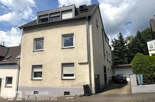 Haus kaufen in 51469 Bergisch Gladbach, Dreiparteienhaus mit Garage und schönem Garten in Bergisch-Gladbach Heidkamp