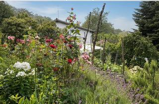 Wohnung kaufen in 42579 Heiligenhaus, Zentrales Leben mitten in der Natur - Eigentumswohnung mit großem Garten
