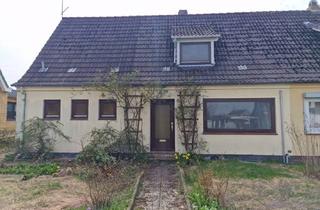 Doppelhaushälfte kaufen in 25813 Husum, Sanierungsbedürftige DHH mit großem Grundstück