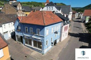 Haus kaufen in 55424 Münster-Sarmsheim, Saniertes Wohn- und Geschäftshaus mit Gewerbeeinheit, zwei vermieteten Wohnungen und Außenstellplatz