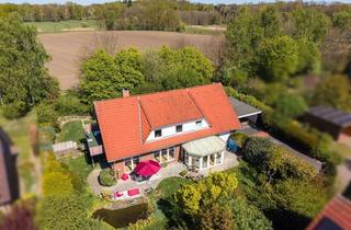 Wohnung kaufen in 21335 Lüneburg, Großzügige Erdgeschosswohnung mit Garten, Sauna & Carport in Lüneburg-Oedeme