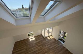 Wohnung kaufen in 21244 Buchholz, Modernisierte City-Dachgeschosswohnung mit Südwestbalkon und großzügigem Zuschnitt